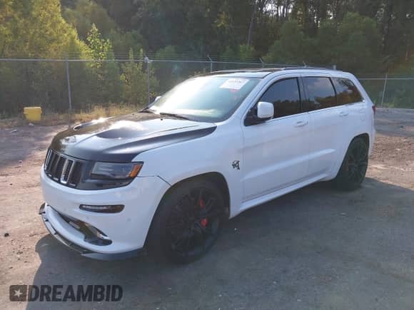 2015 Jeep Grand Cherokee SRT z VIN 1C4RJFDJ7FC844795, wystawiony jako IAAI lot #43235367 z przebiegiem 79 709 mil mil oraz . Historia ofert i sprzedaży dostępna na DreamBid. Obrazek 2.