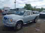 2000 Nissan Frontier XE with VIN 1N6ED26T9YC303924, listed as a IAAI auction lot 43309707 with 161,653 mi miles and . Bid and sale history available at DreamBid. Image 18.