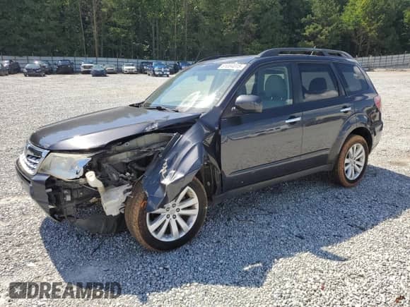 2011 Subaru Forester X Limited z VIN JF2SHBFC3BH711292, wystawiony jako Copart lot #61084015 z przebiegiem 103 472 mil mil oraz Szkoda całkowita • Salvage title. Historia ofert i sprzedaży dostępna na DreamBid. Obrazek 1.