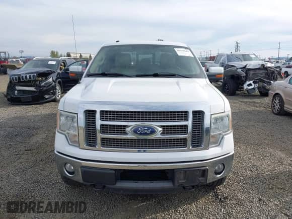 2011 Ford F-150 XLT z VIN 1FTFW1ET2BFA99583, wystawiony jako IAAI lot #43530602 z przebiegiem 191 786 mil mil oraz . Historia ofert i sprzedaży dostępna na DreamBid. Obrazek 12.