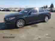 2018 Kia Optima LX with VIN 5XXGT4L3XJG258285, listed as a Copart auction lot 70313075 with 89,863 mi miles and Salvage title. Bid and sale history available at DreamBid. Image 1.