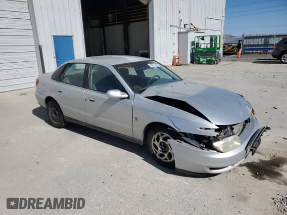 2002 Saturn LS with VIN 1G8JU54F42Y503050, listed as a Copart auction lot 80817005 with 131,553 mi miles and Salvage title. Bid and sale history available at DreamBid. Image 4.