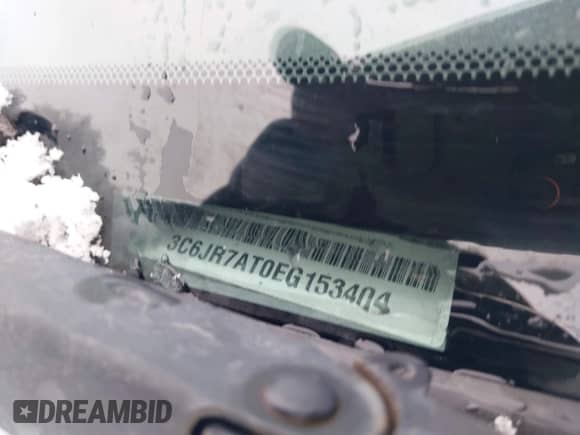 2014 Ram 1500 Express z VIN 3C6JR7AT0EG153404, wystawiony jako IAAI lot #41483525 z przebiegiem 112 077 mil mil oraz . Historia ofert i sprzedaży dostępna na DreamBid. Obrazek 9.