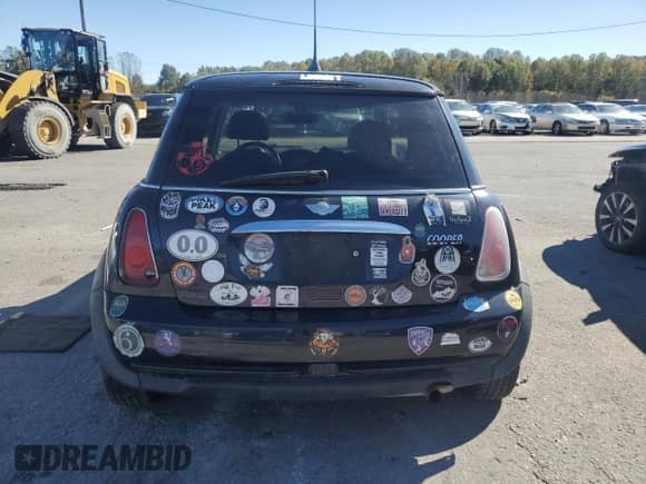 2005 MINI Hardtop with VIN WMWRC33425TC57990, listed as a Copart auction lot 86117205 with Not provided miles and Clean title. Bid and sale history available at DreamBid. Image 6.