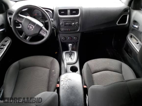 2013 Dodge Avenger SE с VIN 1C3CDZAB6DN652074, выставлен на аукционе Copart как лот 61189114 с пробегом 169 536 миль миль и Списание • Salvage title. История ставок и продаж доступна на DreamBid. Изображение 8.