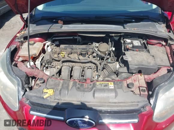 2014 Ford Focus Titanium z VIN 1FADP3N24EL158443, wystawiony jako IAAI lot #42801477 z przebiegiem 116 859 mil mil oraz . Historia ofert i sprzedaży dostępna na DreamBid. Obrazek 10.