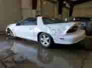 1997 Chevrolet Camaro Z28 z VIN 2G1FP22PXV2143533, wystawiony jako Copart lot #69070734 z przebiegiem 95 348 mil mil oraz Nie do naprawy • Non repairable. Historia ofert i sprzedaży dostępna na DreamBid. Obrazek 2.