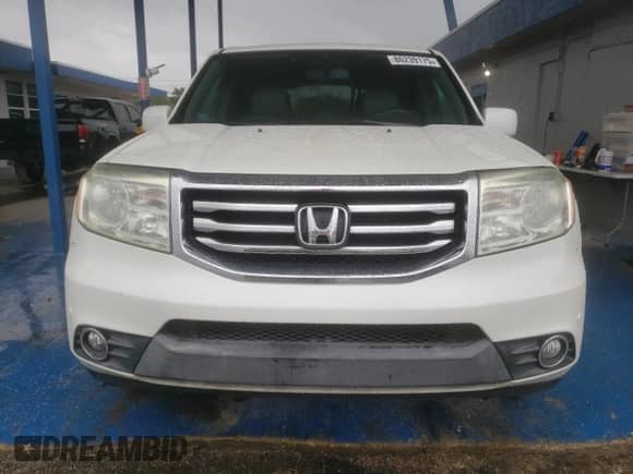 2014 Honda Pilot Touring z VIN 5FNYF4H94EB051537, wystawiony jako Copart lot #86239175 z przebiegiem 128 827 mil mil oraz Czysty tytuł • Clean title. Historia ofert i sprzedaży dostępna na DreamBid. Obrazek 5.