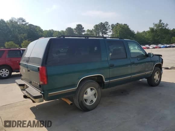 1997 Chevrolet Suburban with VIN 3GNFK16RXVG114579, listed as a Copart auction lot 57333295 with 117,040 mi miles and Salvage title. Bid and sale history available at DreamBid. Image 3.