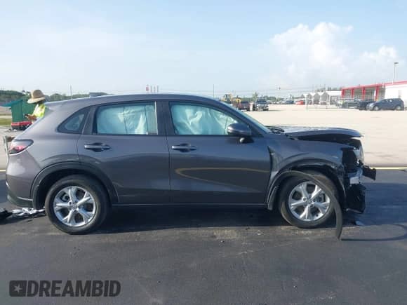 2025 Honda HR-V LX с VIN 3CZRZ1H33SM718556, выставлен на аукционе IAAI как лот 42620898 с пробегом 43 508 миль миль и . История ставок и продаж доступна на DreamBid. Изображение 14.