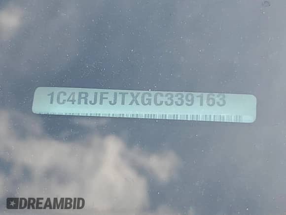 2016 Jeep Grand Cherokee Summit with VIN 1C4RJFJTXGC339163, listed as a Copart auction lot 66264845 with 105,731 mi miles and Salvage title. Bid and sale history available at DreamBid. Image 13.