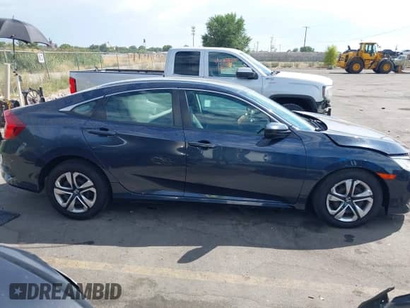 2016 Honda Civic LX with VIN 19XFC2F56GE246942, listed as a IAAI auction lot 43050802 with 99,087 mi miles and . Bid and sale history available at DreamBid. Image 13.