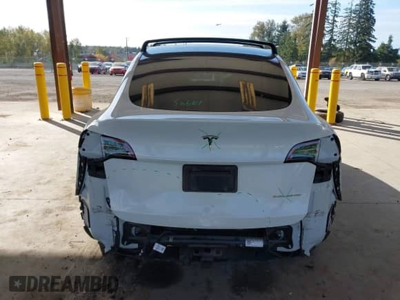 2021 Tesla Model Y Long Range with VIN 5YJYGDEE6MF138868, listed as a IAAI auction lot 43401839 with 134,786 mi miles and . Bid and sale history available at DreamBid. Image 17.