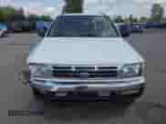 1999 Nissan Pathfinder XE with VIN JN8AR05Y3XW301785, listed as a Copart auction lot 64842735 with 213,703 mi miles and Salvage title. Bid and sale history available at DreamBid. Image 5.