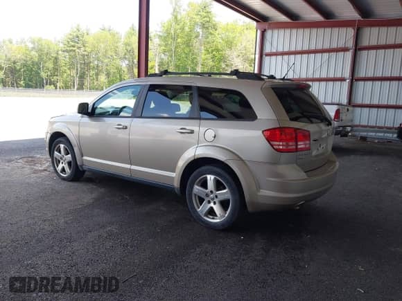 2009 Dodge Journey SXT with VIN 3D4GH57V49T167132, listed as a IAAI auction lot 42578628 with 137,306 mi miles and . Bid and sale history available at DreamBid. Image 3.