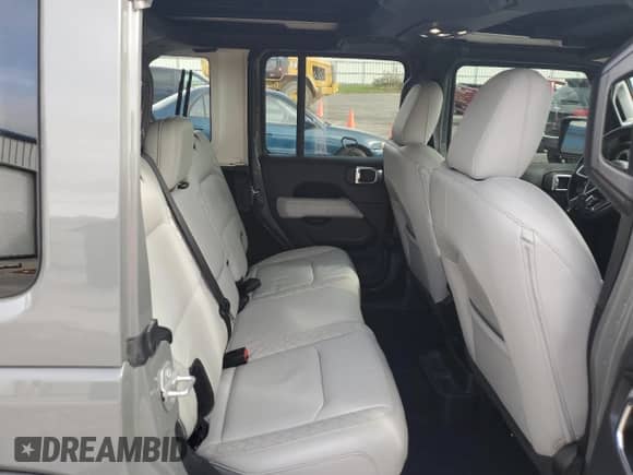 2022 Jeep Wrangler Unlimited Sahara with VIN 1C4HJXEM8NW217773, listed as a Copart auction lot 85325825 with 66,628 mi miles and Salvage title. Bid and sale history available at DreamBid. Image 11.