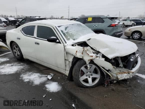 2009 Dodge Charger SXT with VIN 2B3KA33V39H626960, listed as a Copart auction lot 44058134 with 203,008 mi miles and Salvage title. Bid and sale history available at DreamBid. Image 4.
