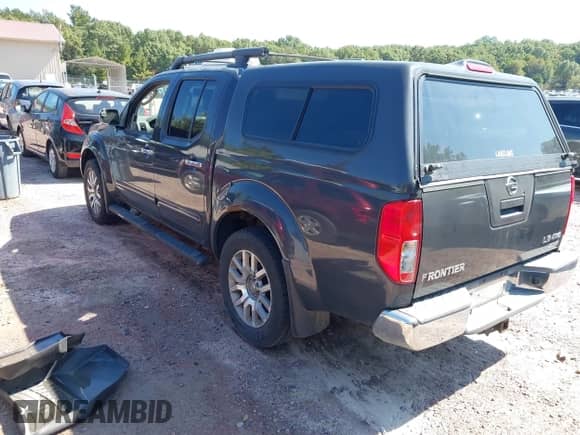 2010 Nissan Frontier LE with VIN 1N6AD0EV3AC415758, listed as a IAAI auction lot 43178391 with 162,783 mi miles and . Bid and sale history available at DreamBid. Image 3.