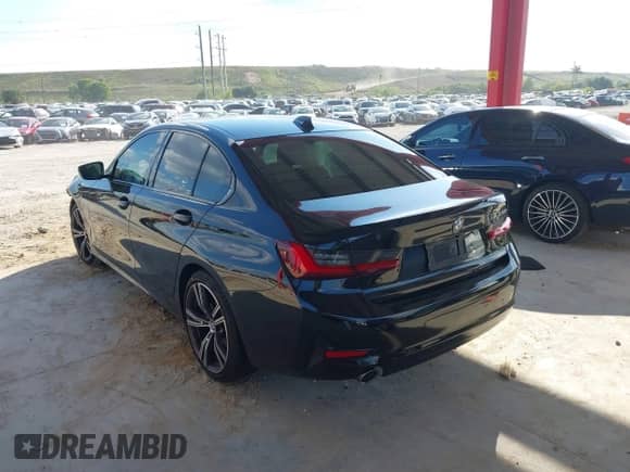 2022 BMW 3 Series 330i with VIN WBA5R1C05NFL77244, listed as a IAAI auction lot 41667834 with 38,964 mi miles and . Bid and sale history available at DreamBid. Image 3.