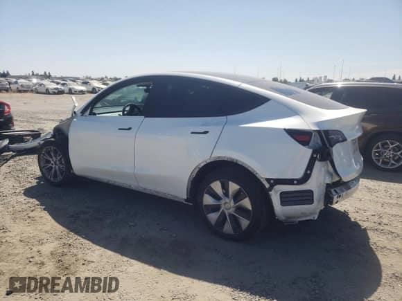 2023 Tesla Model Y Long Range с VIN 7SAYGDEE2PF662932, выставлен на аукционе Copart как лот 66630524 с пробегом 20 221 миль миль и Списание • Salvage title. История ставок и продаж доступна на DreamBid. Изображение 2.