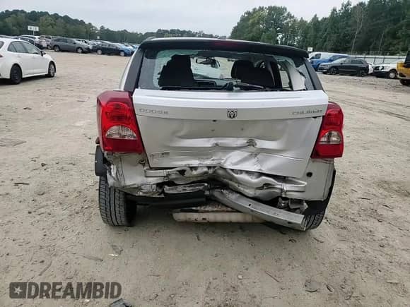 2011 Dodge Caliber Mainstreet z VIN 1B3CB3HA7BD204555, wystawiony jako Copart lot #81948085 z przebiegiem 219 752 mil mil oraz Szkoda całkowita • Salvage title. Historia ofert i sprzedaży dostępna na DreamBid. Obrazek 14.