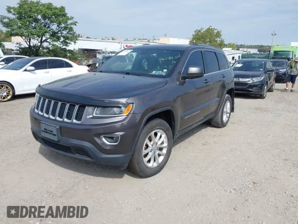 2016 Jeep Grand Cherokee Laredo with VIN 1C4RJFAG1GC384981, listed as a IAAI auction lot 43275637 with 98,214 mi miles and . Bid and sale history available at DreamBid. Image 2.