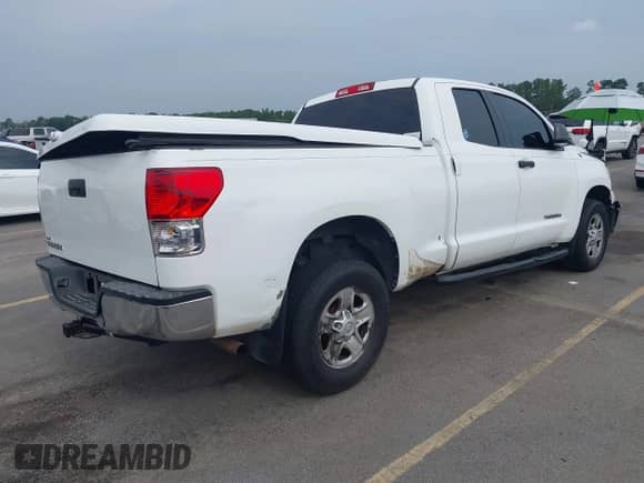 2012 Toyota Tundra z VIN 5TFRU5F17CX027958, wystawiony jako IAAI lot #42690061 z przebiegiem 228 438 mil mil oraz . Historia ofert i sprzedaży dostępna na DreamBid. Obrazek 4.