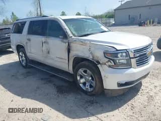 2018 Chevrolet Suburban Premier z VIN 1GNSKJKC9JR323192, wystawiony jako IAAI lot #42096522 z przebiegiem 148 240 mil mil oraz . Historia ofert i sprzedaży dostępna na DreamBid. Obrazek 1.