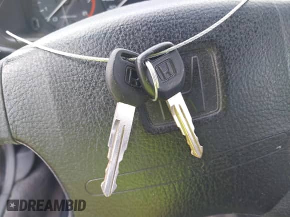 1993 Honda Accord z VIN 1HGCB7653PA050819, wystawiony jako IAAI lot #42863663 z przebiegiem 138 523 mil mil oraz . Historia ofert i sprzedaży dostępna na DreamBid. Obrazek 11.