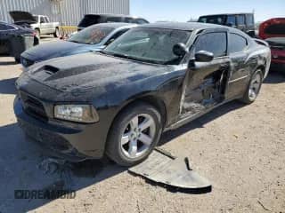2007 Dodge Charger Police z VIN 2B3KA43H87H817495, wystawiony jako Copart lot #76962154 z przebiegiem 76 476 mil mil oraz Szkoda całkowita • Salvage title. Historia ofert i sprzedaży dostępna na DreamBid. Obrazek 1.
