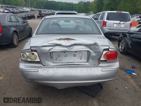 2003 Hyundai Sonata with VIN KMHWF25H23A858454, listed as a IAAI auction lot 42016877 with 135,539 mi miles and . Bid and sale history available at DreamBid. Image 16.