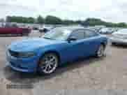 2023 Dodge Charger SXT with VIN 2C3CDXBG7PH607883, listed as a IAAI auction lot 42656812 with 8,575 mi miles and . Bid and sale history available at DreamBid. Image 2.