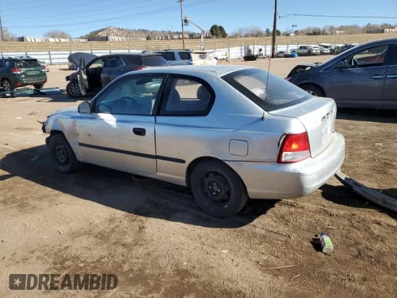 2002 Hyundai Accent z VIN KMHCF35G22U229645, wystawiony jako Copart lot #42605265 z przebiegiem 181 867 mil mil oraz Szkoda całkowita • Salvage title. Historia ofert i sprzedaży dostępna na DreamBid. Obrazek 2.