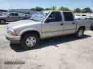 2004 Chevrolet S-10 LS z VIN 1GCDT13X14K113828, wystawiony jako Copart lot #64229655 z przebiegiem 100 013 mil mil oraz Szkoda całkowita • Salvage title. Historia ofert i sprzedaży dostępna na DreamBid. Obrazek 1.
