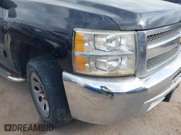 2012 Chevrolet Silverado 1500 LS z VIN 3GCPCREA7CG105775, wystawiony jako IAAI lot #41752232 z przebiegiem 271 970 mil mil oraz . Historia ofert i sprzedaży dostępna na DreamBid. Obrazek 17.