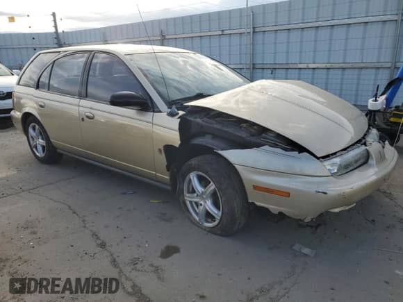 1997 Saturn SW with VIN 1G8ZK8276VZ295659, listed as a Copart auction lot 47964235 with 122,219 mi miles and Salvage title. Bid and sale history available at DreamBid. Image 4.