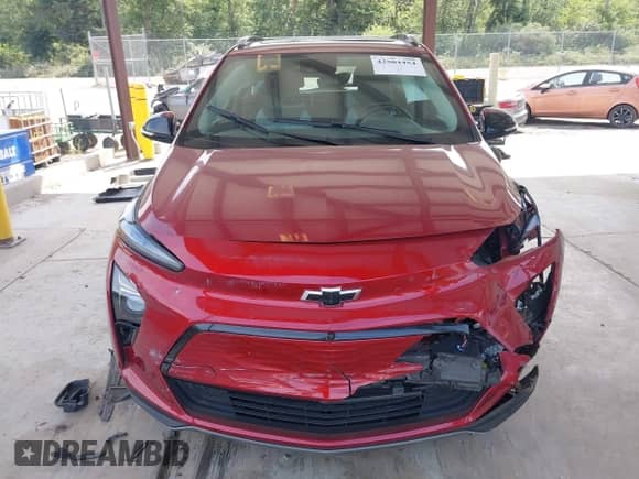 2022 Chevrolet Bolt EUV Premier z VIN 1G1FZ6S00N4117733, wystawiony jako IAAI lot #42504454 z przebiegiem 74 647 mil mil oraz . Historia ofert i sprzedaży dostępna na DreamBid. Obrazek 12.
