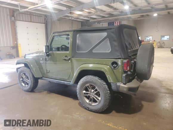 2016 Jeep Wrangler Sahara с VIN 1C4AJWBG5GL221617, выставлен на аукционе Copart как лот 48805755 с пробегом 70 883 миль миль и Списание • Salvage title. История ставок и продаж доступна на DreamBid. Изображение 2.