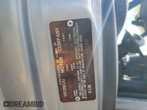 1999 Hyundai Elantra GL z VIN KMHJF25F4XU842009, wystawiony jako Copart lot #60836875 z przebiegiem 190 248 mil mil oraz Szkoda całkowita • Salvage title. Historia ofert i sprzedaży dostępna na DreamBid. Obrazek 13.