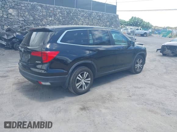 2018 Honda Pilot EX with VIN 5FNYF6H32JB014472, listed as a IAAI auction lot 43000601 with 50,575 mi miles and . Bid and sale history available at DreamBid. Image 4.