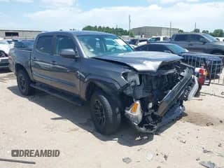 2022 Toyota Tacoma SR with VIN 3TYAX5GN7NT038087, listed as a IAAI auction lot 42647285 with 90,455 mi miles and . Bid and sale history available at DreamBid. Image 1.