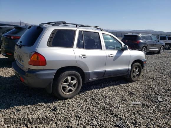 2003 Hyundai Santa Fe GLS с VIN KM8SC73D23U442536, выставлен на аукционе Copart как лот 53171725 с пробегом 131 554 миль миль и Списание • Salvage title. История ставок и продаж доступна на DreamBid. Изображение 3.