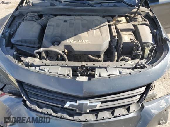 2015 Chevrolet Impala LT z VIN 1G1125S37FU111884, wystawiony jako Copart lot #82607565 z przebiegiem 163 164 mil mil oraz Szkoda całkowita • Salvage title. Historia ofert i sprzedaży dostępna na DreamBid. Obrazek 11.