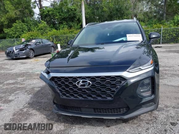 2020 Hyundai Santa Fe SEL z VIN 5NMS33AD3LH245009, wystawiony jako IAAI lot #43375112 z przebiegiem 66 268 mil mil oraz . Historia ofert i sprzedaży dostępna na DreamBid. Obrazek 13.