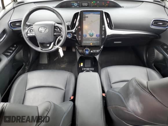 2021 Toyota Prius Limited with VIN JTDKAMFU9M3148580, listed as a Copart auction lot 82145025 with 64,877 mi miles and Salvage title. Bid and sale history available at DreamBid. Image 8.