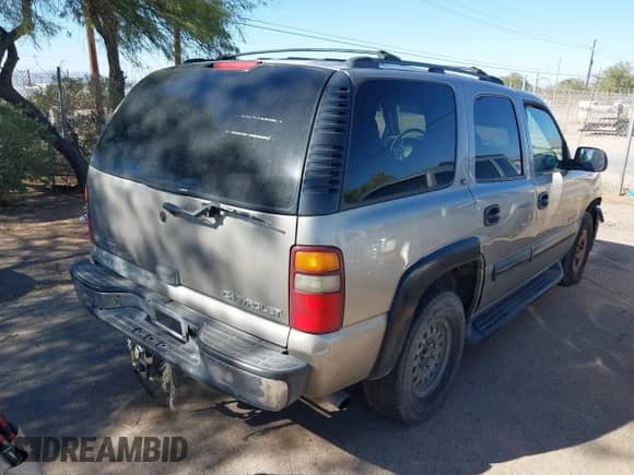 2001 Chevrolet Tahoe LS with VIN 1GNEC13T31R112837, listed as a IAAI auction lot 37967823 with Not provided miles and . Bid and sale history available at DreamBid. Image 4.