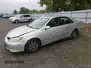 2005 Toyota Camry LE z VIN 4T1BF32K95U084032, wystawiony jako Copart lot #82052665 z przebiegiem 261 218 mil mil oraz Szkoda całkowita • Salvage title. Historia ofert i sprzedaży dostępna na DreamBid. Obrazek 1.