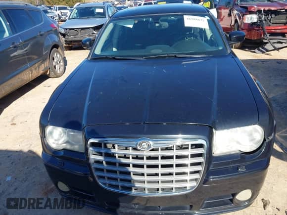 2006 Chrysler 300 C SRT-8 with VIN 2C3LA73W06H216409, listed as a IAAI auction lot 41588832 with 187,662 mi miles and . Bid and sale history available at DreamBid. Image 12.