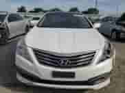 2015 Hyundai Azera Limited с VIN KMHFH4JG1FA453595, выставлен на аукционе Copart как лот 52979545 с пробегом 127 620 миль миль и Списание • Salvage title. История ставок и продаж доступна на DreamBid. Изображение 5.