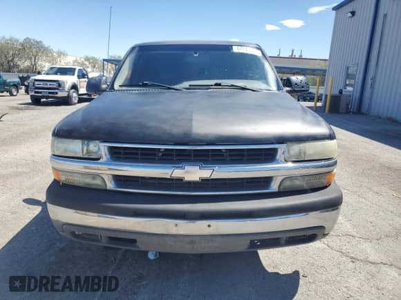 2001 Chevrolet Tahoe LS with VIN 1GNEC13T01R199886, listed as a Copart auction lot 64245125 with 242,201 mi miles and Salvage title. Bid and sale history available at DreamBid. Image 5.